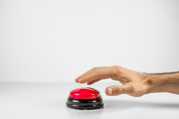 Hand Deciding Whether to Press the Big Red Button