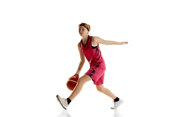 Fotobehang Dribbling. Teen girl, basketball player in motion, playing, training isolated over white studio background. Concept of sportive lifestyle, active hobby, health, endurance, competition © master1305