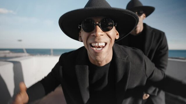 Black Man Artist, Twin Singers Band, Performing and Singing Hit Hip Hop Song for the Music Video 