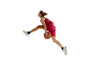 Side view. Dynamic portrait of teen girl, basketball player in motion, in a jump isolated over...