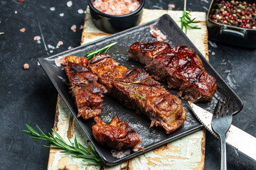 pork steak with herbs and spices on the grill pan, Restaurant menu, dieting, cookbook recipe place for text