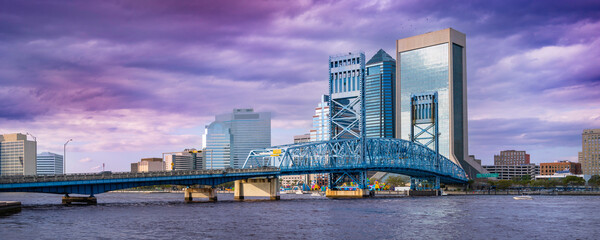 Jacksonville City Downtown Skyline and Buildings with dramatic winter storm cloudscape over John T. Alsop Jr. Bridge, the landmark lift bridge on Main Street over the St. Johns River in North Florida