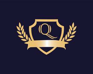 Golden Black Shield LOgo of  Q