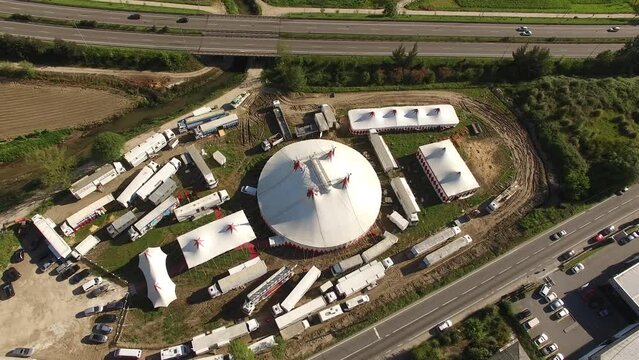 Travelling Circus on Road in Small Village