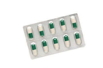 Medical blister packs with pills isolated on white background