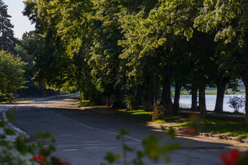 river waterfront at sunrise. cityscape in summer. warm sunny weather