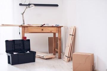 Rustic wooden table and shelves in a modern apartment.