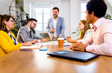 Group of business people working in office.
