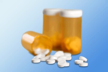 Medical pills in prescription drug plastic bottle