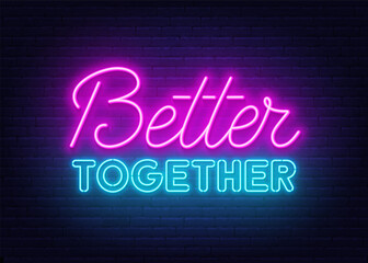 Better Together neon sign on brick wall background.