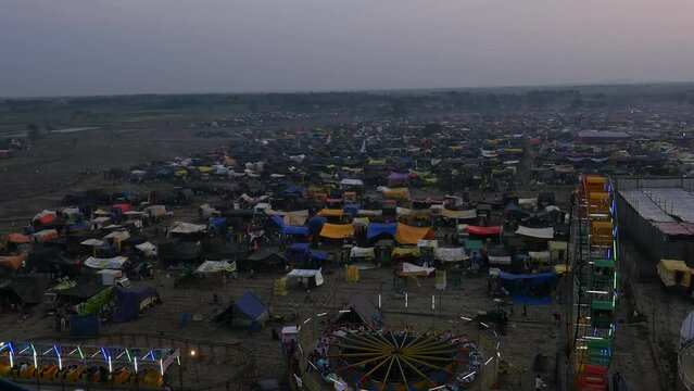 A view from the Ferris wheel a sizable Indian fair with shops and crowds