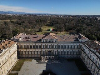 Naklejka premium Aerial view of facade of the elegant Villa Reale in Monza, Lombardy, north Italy. Birds eye of the beautiful Royal Palace of Monza. Drone photography in Lombardia.