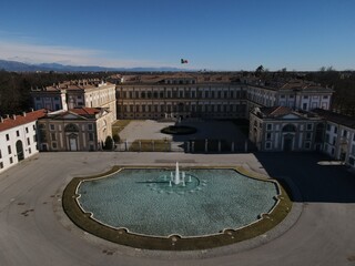 Naklejka premium Aerial view of facade of the elegant Villa Reale in Monza, Lombardy, north Italy. Birds eye of the beautiful Royal Palace of Monza. Drone photography in Lombardia.