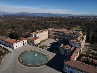 Naklejka premium Aerial view of facade of the elegant Villa Reale in Monza, Lombardy, north Italy. Birds eye of the beautiful Royal Palace of Monza. Drone photography in Lombardia.
