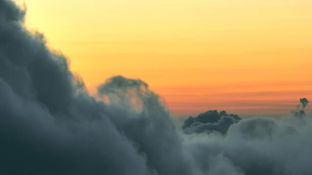 Colorful Orange Sky Behind Dense Clouds Just Before Sunrise, Parallax Drone Shot