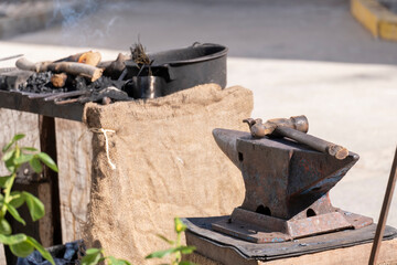 An old iron anvil for forging metal in a smithy or forge,old iron tool