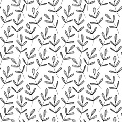 Vector seamless doodle floral pattern. Simple leaves on branches in monochrome colors on a white background