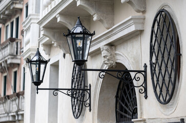 Old wall street lighting, in the old town, Venice, Italy