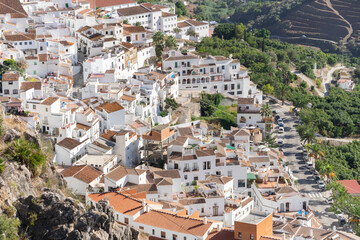 Fototapeta na wymiar Beautiful aerial views over the white village of Frigiliana, one of the most beautiful villages of Malaga and Spain. 