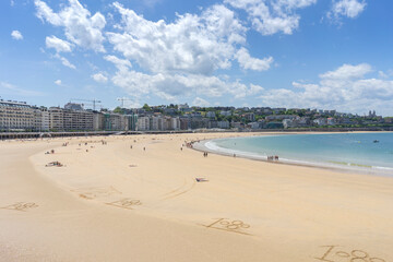 La Concha beach in San Sebastian with fine sand (Donostia) on a beautiful summer day, Spain.