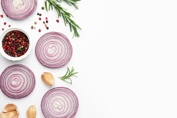 Fresh red onions, garlic, rosemary and spices on white background, flat lay. Space for text