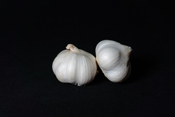 white garlic with black background, food and seasoning, garlic