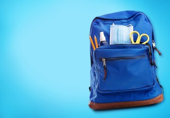 School stylish backpack with a lot of stationery