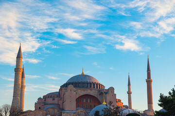 Fototapeta na wymiar Hagia Sophia or Ayasofya Mosque at sunrise with partly cloudy sky.