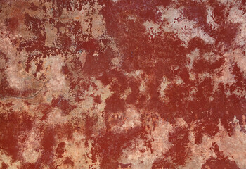 Grunge red brown old painted stone wall