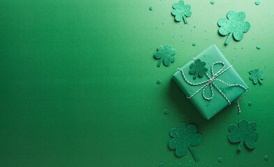 Happy St Patrick's Day decoration concept made from shamrocks ( clover leaf), gift box and...