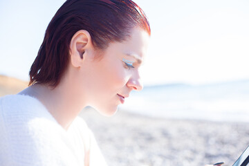 The portrait of woman walking in the beache in sprin weather