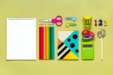 Frame from school and office supplies Paper clips, pens, calculator, sharpener, notepad, stapler...