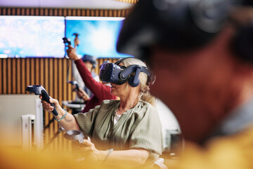 Senior woman and friends visiting a vr club