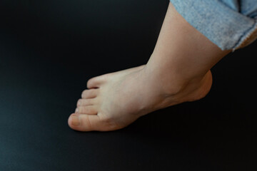 feet on the black backround