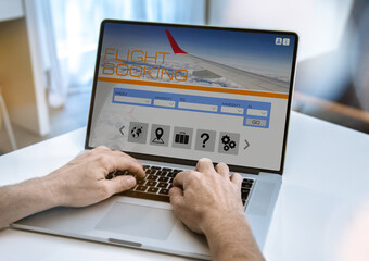 Man search ticket vacation on laptop. Booking flight. Plan travel, book holidays. Traveling concept
