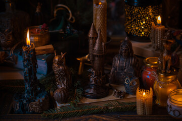 Illustration of magical stuff....candle light, magic wand, book of spells dark background, magic...