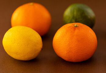 bunch of tropical fruits lemon,oranges and lime