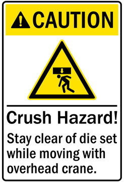 Overhead crane hazard sign and labels stay clear of die set while moving with overhead crane