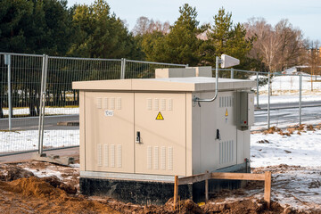 Naklejka premium New electric control cabinet stand at new construction site