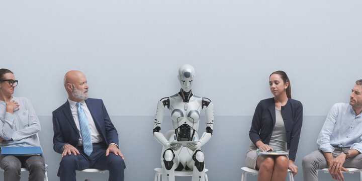 Job applicants staring at the robot candidate and waiting for the job interview