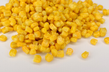 Sweet yellow corn on a white background.