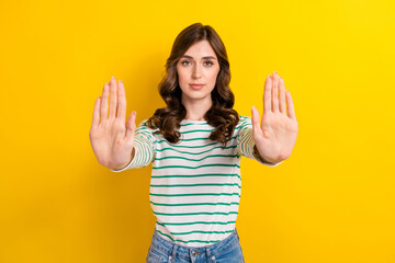 Photo of cute adorable gorgeous girl with wavy hairdo dressed striped shirt show no stop gesture...