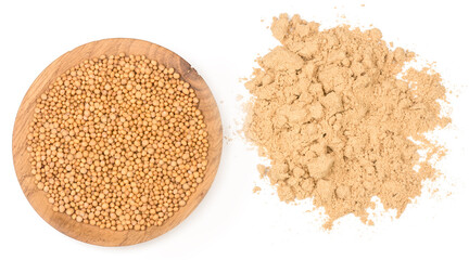 Mustard grains and mustard powder isolated on a white background