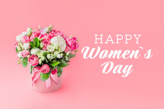 happy women s day greeting card with text on pink background