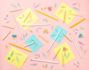 stationery items for girls or women on light pink background. Back to school. Female Student's, pupil's or engineer's supplies. Office objects on pastel pink background. Calculator, keyboard