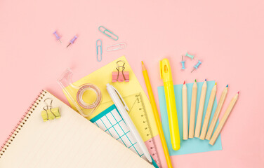 stationery items for girls or women on light pink background. Back to school. Female Student's, pupil's or engineer's supplies. Office objects on pastel pink background. Calculator, keyboard - 574676958