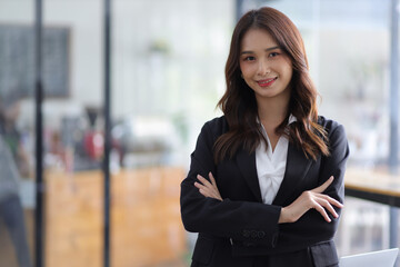 Fototapeta premium Portrait businesswoman beautiful asian woman in business office.