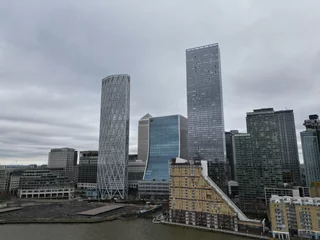 Deurstickers Riverside appartments Canary wharf London UK drone aerial view © steve