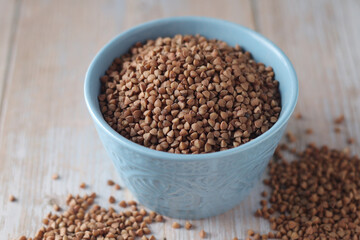 Buckwheat grain in a small ceramic bowl