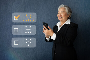 Businesswoman gives ratings to service experience on a smartphone, Service Provider Satisfaction Ratings and Evaluations,  Satisfaction concept and Customer services